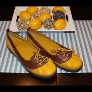 Rare Cole Haan slip on leather rain boots